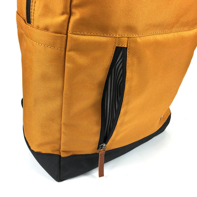 vintage canvas backpack. waterproof canvas backpack. canvas laptop backpack. large canvas backpack. 100recycled backpack. socially responsible backpacks. backpacks made from recycled materials. sustainable travel bag. book bags for college. backpacks for school. burnt orange.