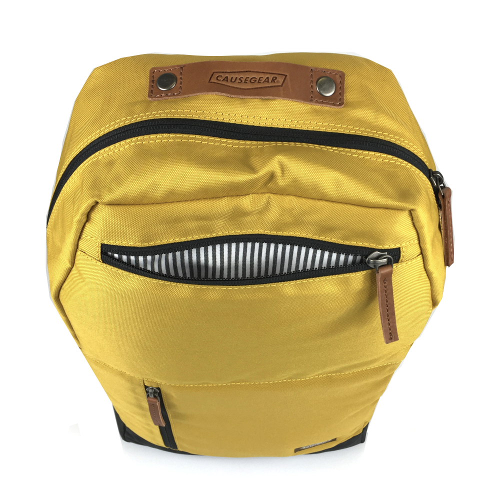 vintage canvas backpack. waterproof canvas backpack. canvas laptop backpack. large canvas backpack. 100recycled backpack. socially responsible backpacks. backpacks made from recycled materials. sustainable travel bag. book bags for college. backpacks for school. mustard.